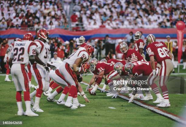 Joe Montana, Quarterback for the San Francisco 49ers calls the play on the line of scrimmage during the National Football League Super Bowl XXIII...