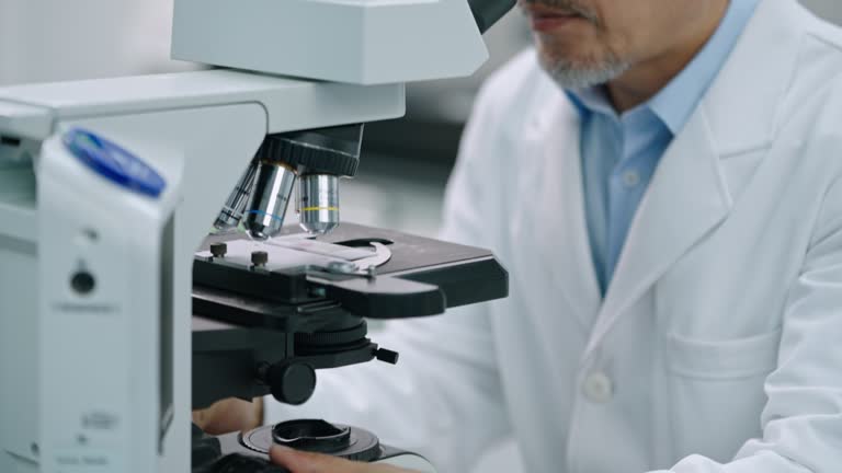 Microscope Man Man Looking Into Microscope Videos and HD Footage - Getty Images