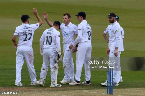 Brad Wheal of Hampshire celebrates with team mates after dismissing Matthew Revis of Yorkshire during the LV= Insurance County Championship match...