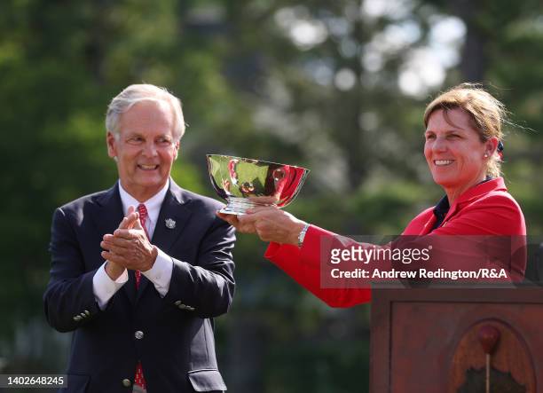 Sarah LeBrun Ingram, Captain of Team USA, lifts the trophy after Team USA wins The Curtis Cup at Merion Golf Club on June 12, 2022 in Ardmore,...
