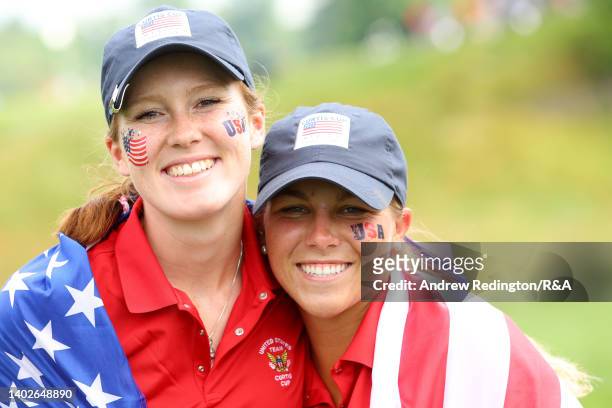 Emilia Migliaccio of Team USA and Jensen Castle of Team USA pose after the Day Three singles matches of The Curtis Cup at Merion Golf Club on June...