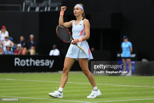 Aleksandra Krunic of Serbia celebrates match point in their Women's Singles First Round match against Petra Martic of Croatia during Day Three of the...