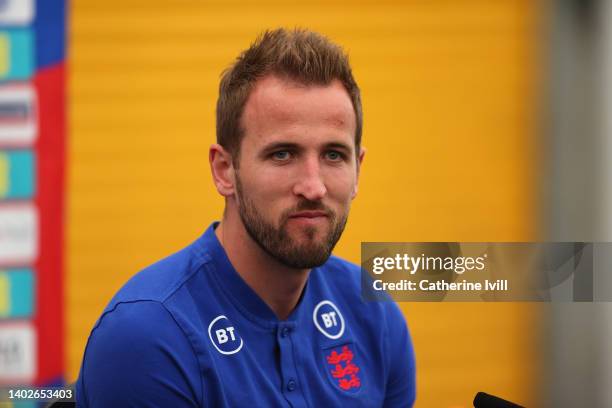 Harry Kane of England speaks to the media during a press conference at The Sir Jack Hayward Training Ground on June 13, 2022 in Wolverhampton,...