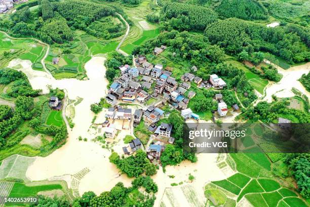 Aerial view of flooded farmland and houses after heavy rainfall at Rong'an County on June 13, 2022 in Liuzhou, Guangxi Zhuang Autonomous Region of...