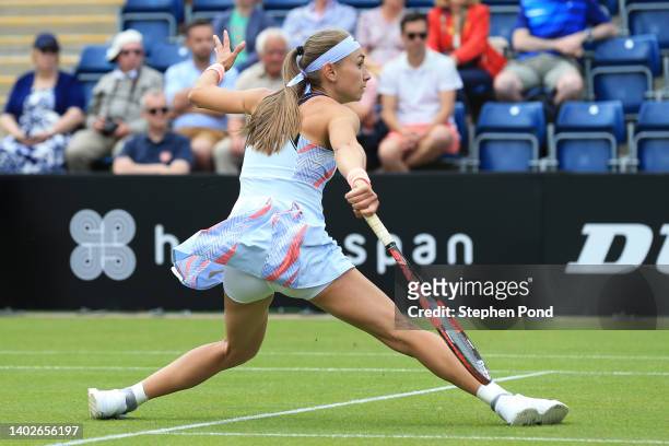 Aleksandra Krunic of Serbia stretches to play a shot in their Women's Singles First Round match against Petra Martic of Croatia during Day Three of...