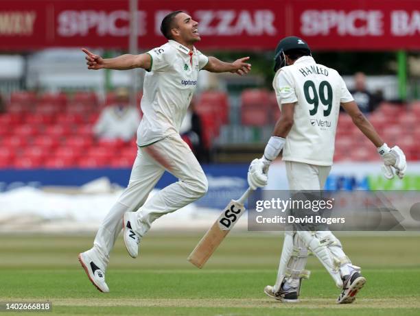 Ben Mike of Leicestershire celebrates after bowling out Haseeb Hameed during the LV= Insurance County Championship match between Leicestershire and...