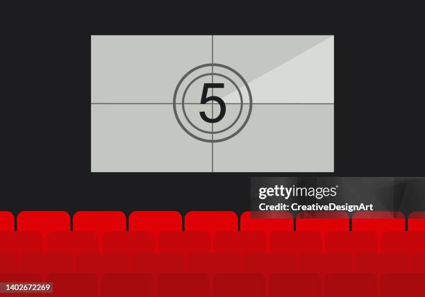 movie theater interior with countdown on white screen and empty red seats - cinematography stock illustrations