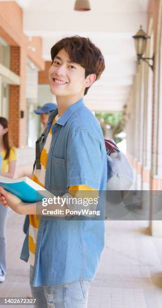 male student smile at you - messestand bildbanksfoton och bilder