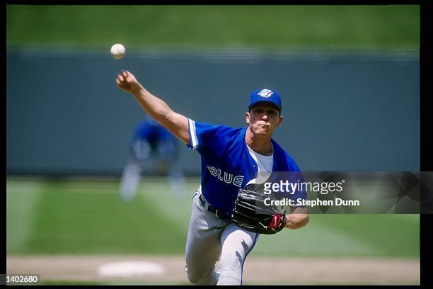 Pitcher David Cone of the Toronto Blue Jays throws a pitch during a game against the Kansas City Royals at Royals Stadium in Kansas City, Missouri....