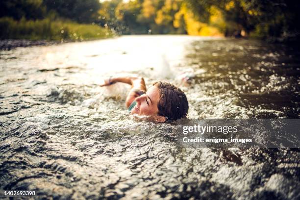 fun on a sunny day - river bathing stock pictures, royalty-free photos & images