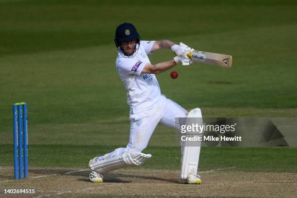 Liam Dawson of Hampshire hiots out during the LV= Insurance County Championship match between Hampshire and Yorkshire at Ageas Bowl on June 13, 2022...
