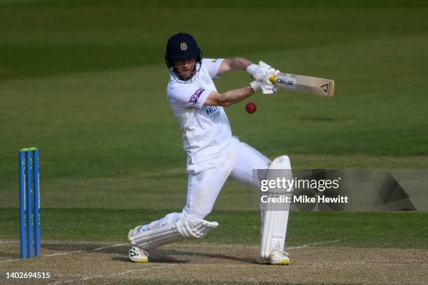 Liam Dawson of Hampshire hiots out during the LV= Insurance County Championship match between Hampshire and Yorkshire at Ageas Bowl on June 13, 2022...