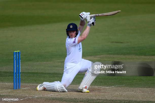 Ben Brown of Hampshire hits a boundary during the LV= Insurance County Championship match between Hampshire and Yorkshire at Ageas Bowl on June 13,...