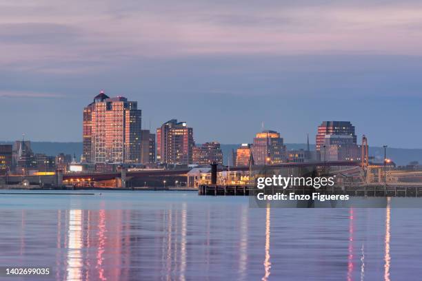 new haven harbor and city skyline at dusk - new haven connecticut stock pictures, royalty-free photos & images