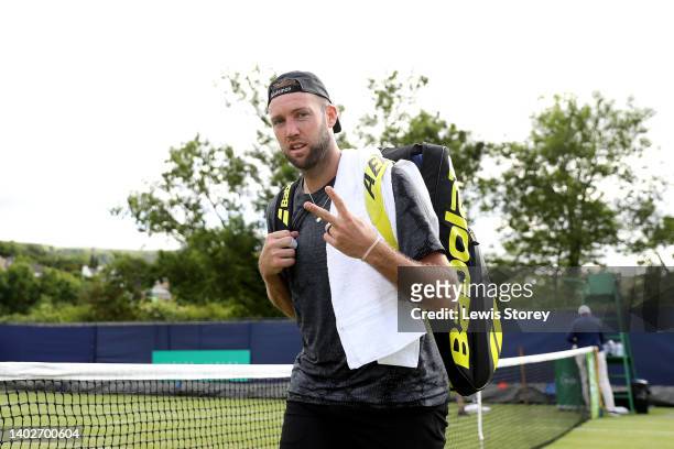 Jack Sock of United States celebrates victory in the ATP match between Jack Sock of United States and Michael Mmoh of United States during Day Two of...