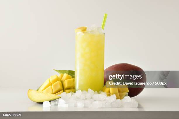 close-up of drink and fruits on table against white background - oxalic acid stock pictures, royalty-free photos & images