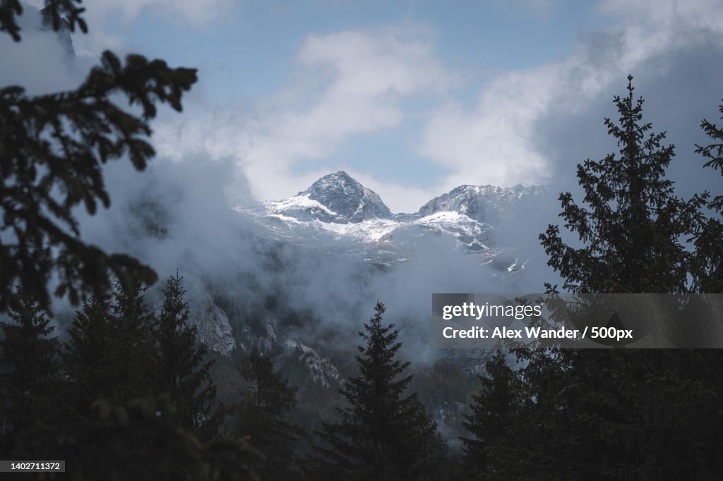 Scenic view of snowcapped mountains against sky