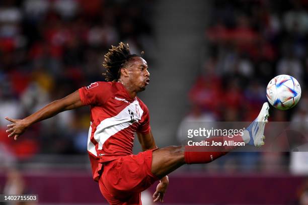 Andre Carrillo of Peru attempts to control the ball in the 2022 FIFA World Cup Playoff match between Australia Socceroos and Peru at Ahmad Bin Ali...