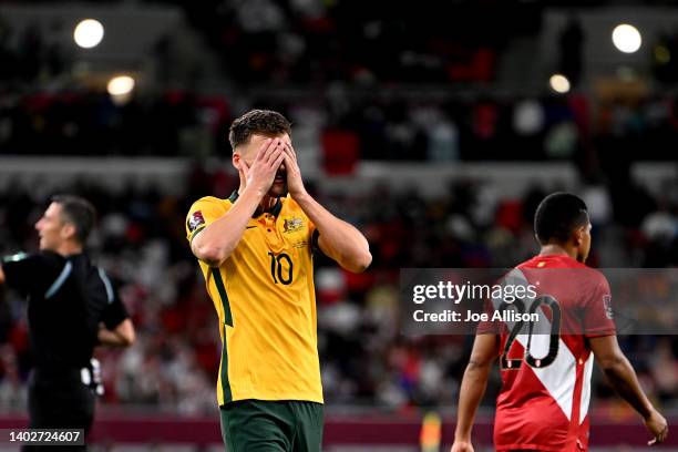 Ajdin Hrustic of Australia reacts after a missed shot at goal in the 2022 FIFA World Cup Playoff match between Australia Socceroos and Peru at Ahmad...