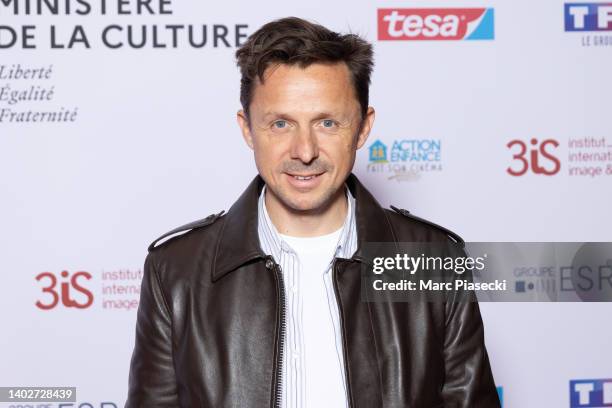 Martin Solveig attends the 5th "Action Enfance Fait Son Cinema" Photocall At Le Grand Rex on June 13, 2022 in Paris, France.