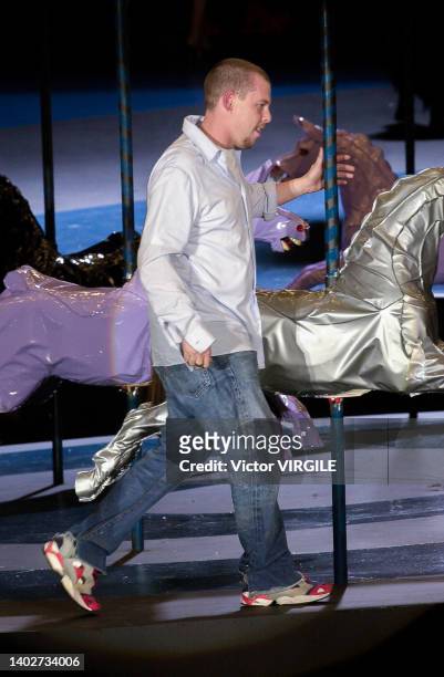 Fashion designer Alexander McQueen walks the runway during the Alexander McQueen Ready to Wear Fall/Winter 2001-2002 fashion show as part of the...