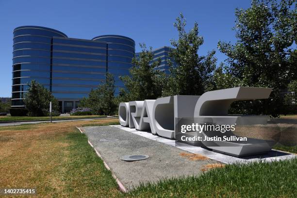 Sign is posted in front of Oracle headquarters on June 13, 2022 in Redwood Shores, California. Oracle reported fourth-quarter earnings with revenue...