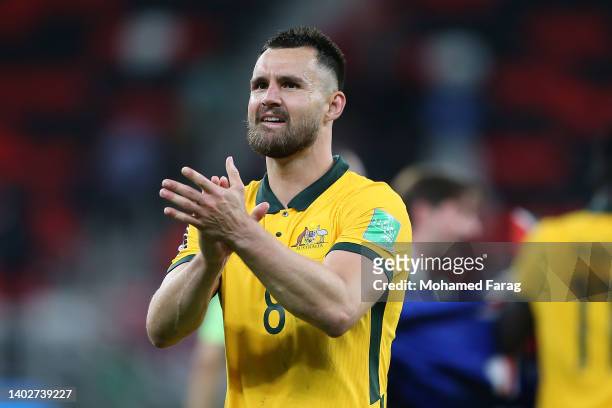 Bailey Wright of Australia applauds fans following their sides victory after a penalty shoot out following the 2022 FIFA World Cup Playoff match...