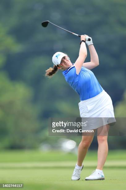 Lauren Walsh of Ireland and of The Great Britain and Ireland Team plays her tee shot on the 14th hole in her match against Rachel Heck during the...
