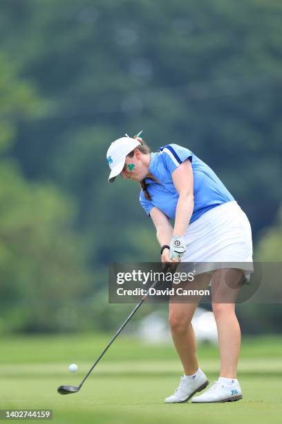 Lauren Walsh of Ireland and of The Great Britain and Ireland Team plays her tee shot on the 14th hole in her match against Rachel Heck during the...