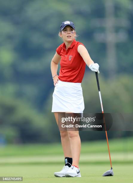 Rachel Heck of The United States Team plays her tee sho on the 14th hole in her match against Lauren Walsh during the singles matches on day three of...