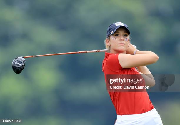 Rachel Heck of The United States Team plays her tee sho on the 14th hole in her match against Lauren Walsh during the singles matches on day three of...