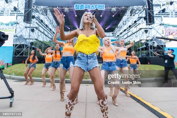 Hyolyn performs on stage with her dancersduring 2022 Bluespring Festival on June 10, 2022 in Seoul, South Korea.