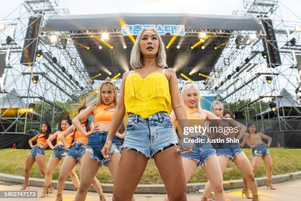 Hyolyn performs on stage with her dancersduring 2022 Bluespring Festival on June 10, 2022 in Seoul, South Korea.