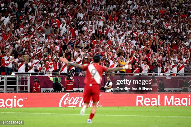 Gianluca Lapadula of Peru celebrates towards fans after scoring a penalty shootout goal in the 2022 FIFA World Cup Playoff match between Australia...