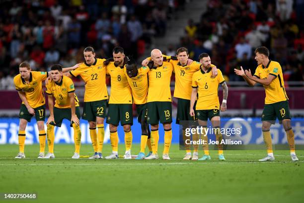 Australia watches on during the penalty shootouts in the 2022 FIFA World Cup Playoff match between Australia Socceroos and Peru at Ahmad Bin Ali...