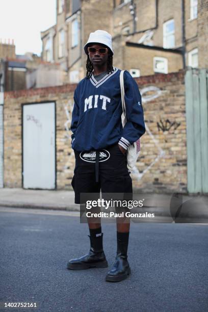 Guest is seen wearing a Navy Sports Top at The University of Westminster MA Menswear on June 12, 2022 in London, England.