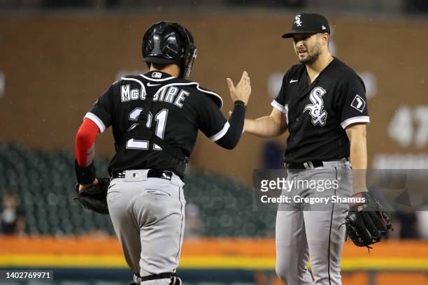 Shelley Duncan of the Chicago White Sox celebrates a 9-5 win over the Detroit Tigers with Reese McGuire Comerica Park on June 13, 2022 in Detroit,...