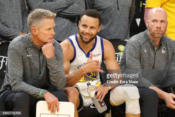 Head coach Steve Kerr and Stephen Curry of the Golden State Warriors looks on during the fourth quarter against the Boston Celtics in Game Five of...