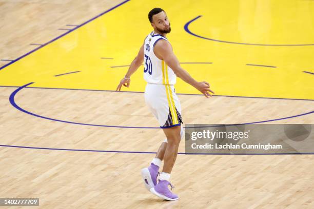Stephen Curry of the Golden State Warriors celebrates a basket during the fourth quarter against the Boston Celtics in Game Five of the 2022 NBA...