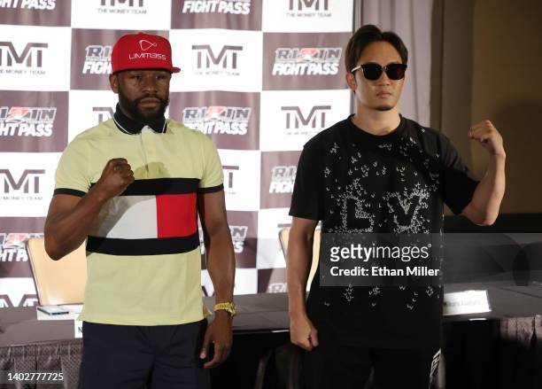 Boxer Floyd Mayweather Jr. And mixed martial artist Mikuru Asakura pose during a news conference announcing their exhibition boxing bout at The M...