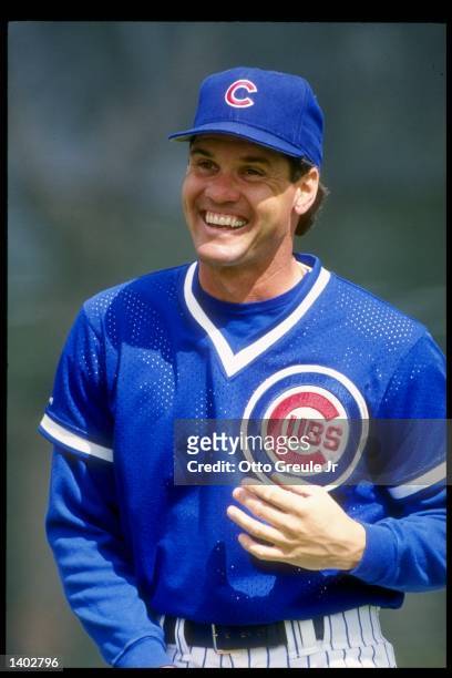 Second baseman Ryne Sandberg of the Chicago Cubs stands on the field during a 1992 preseason game against the Milwaukee Brewers.