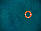 Top view of lifebuoy in the sea. Life ring floating in a sea.