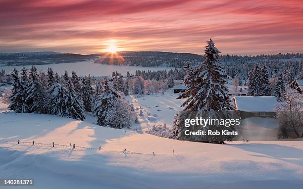 sunrise on snow covered village in norway - lillehammer photos et images de collection
