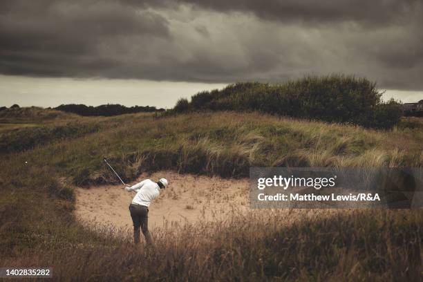 Ronan Kleu of Switzerland plays out of a bunker on the 4th hole during day two of the R&A Amateur Championship at Royal Lytham & St. Annes on June...