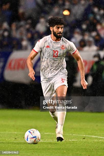 Ferjani Sassi of Tunisia in action during the international friendly match between Japan and Tunisia at Panasonic Stadium Suita on June 14, 2022 in...