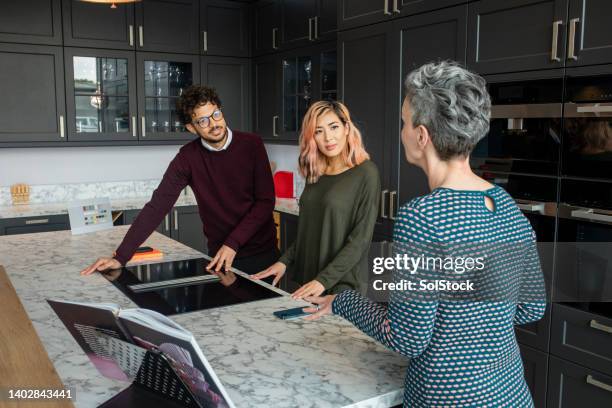 Kitchen Discussion 5,797 Designer Kitchen Stock Photos, High-Res Pictures, and Images ...