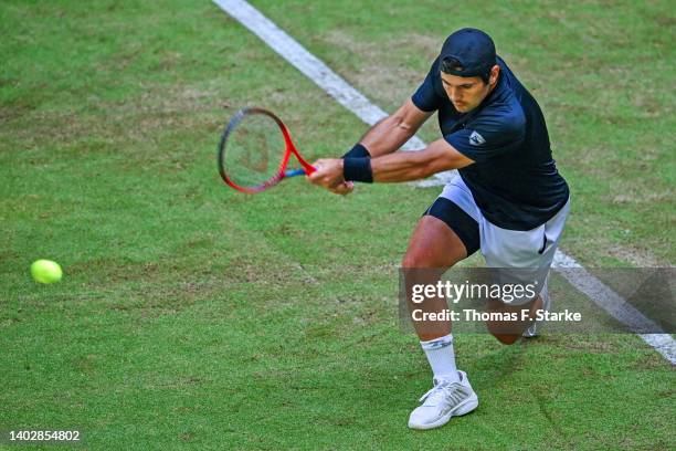 Marcos Giron of the United States plays a backhand in his match against Felix Auger-Aliassime of Canada during day four of the 29th Terra Wortmann...