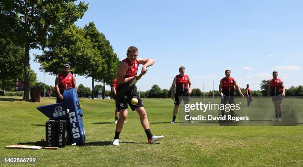 Owen Farrell plays the ball as the team warm up playing a game of cricket prior to the Saracens training session ahead of the Gallagher Premiership...