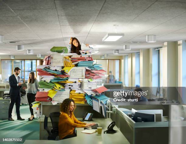overload at the office - pile of paper bildbanksfoton och bilder