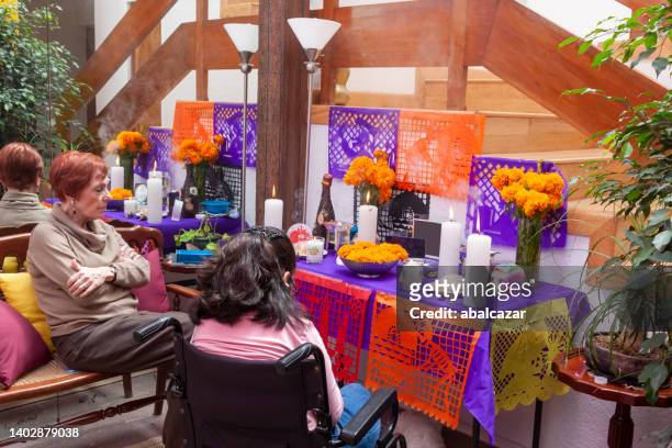setting up day of the dead offering - day of the dead stock pictures, royalty-free photos & images